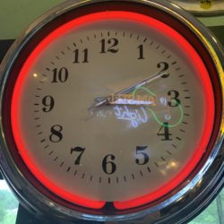 Large red neon wall clock