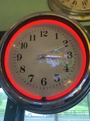 Large red neon wall clock