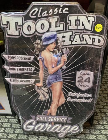 Classic tool in hand garage sign